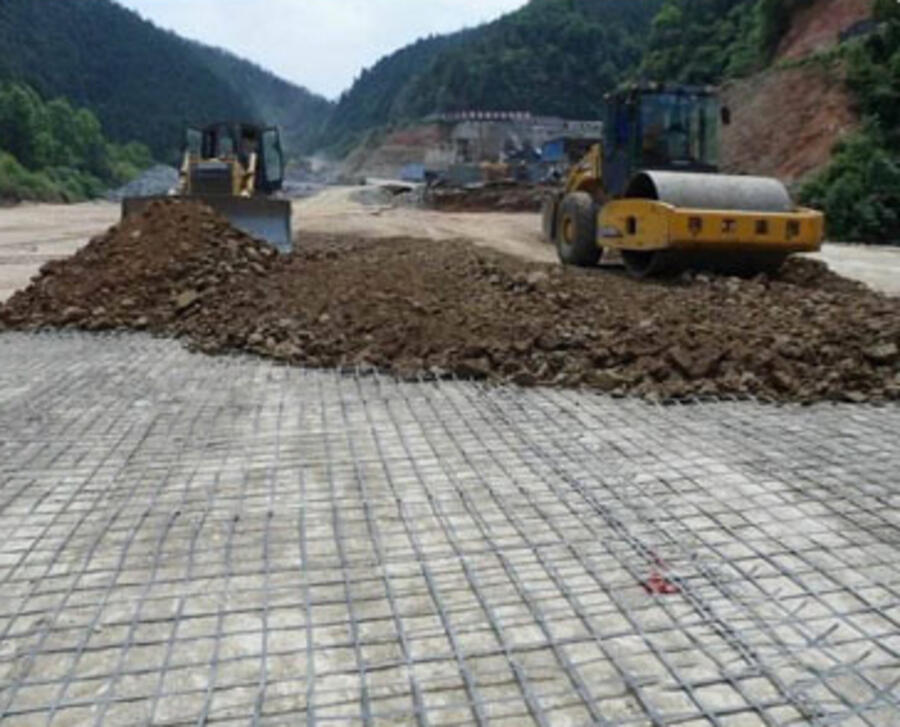 Steel-plastic geogrid roadbed reinforcement